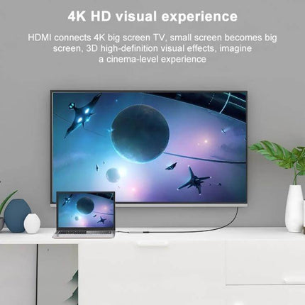 Versatile USB-C 6-in-1 Docking Station with HDMI and USB Ports connected to laptop and 4K TV showing seamless display