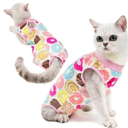Comfortable Outfit for Cats During Home Recovery Times - pink cotton recovery suit with colorful donut and swirl print on white cat