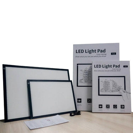A4 Black LED Copy Board with Stepless Dimming for Drawing showing two sizes, packaging, and power cord for tracing and sketching