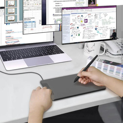 VEIKK VK640 Compact Drawing Tablet for Digital Artists on desk with stylus connected to laptop for sketching