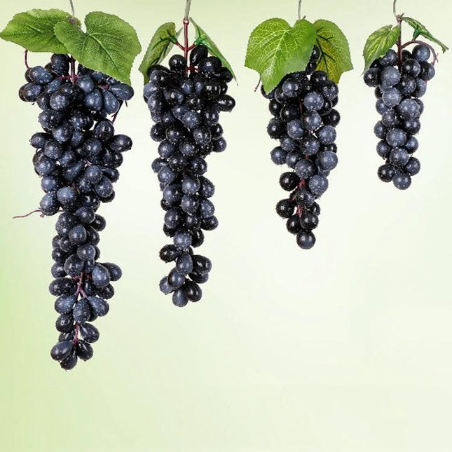 Set of Artificial Grape Bunches in Multiple Colors for Decoration - realistic rubber grape bunches in dark purple hanging with leaves