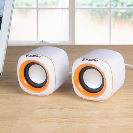 YEEZE Compact USB Desktop Speaker For Laptops And Meetings white orange pair on desk for laptop calls and meetings