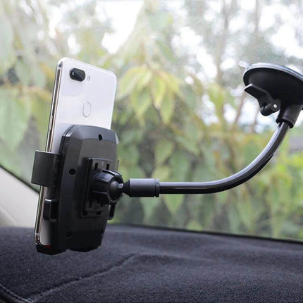 Car Windshield Phone Holder With Automatic Lock Black securely mounted on windshield with smartphone, suction cup and one-handed automatic lock