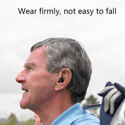 Seniors' Hearing Aid with Noise Reduction for Daily Conversations worn by senior golfer demonstrating secure fit and clear speech