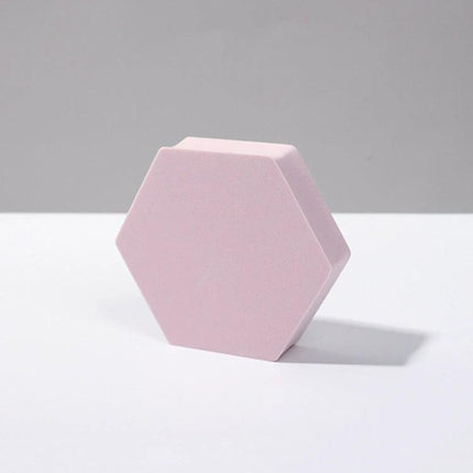 Geometric White Cube Photo Props Set for Photography Sessions showing a single pink hexagonal polymer foam prop for product photography