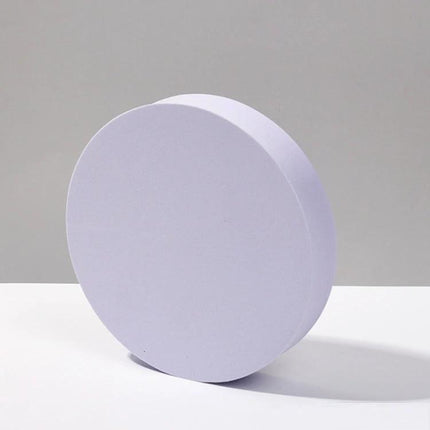Geometric White Cube Photo Props Set for Photography Sessions showing a round white polymer foam prop used to display jewelry and cosmetics
