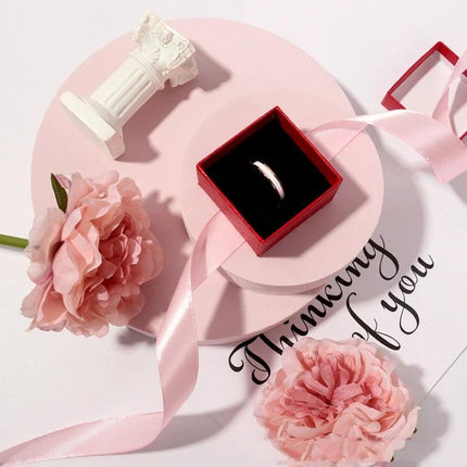 Geometric Photo Props Set in Various Sizes and Colors with pink round platforms, red ring box, silk ribbons and flowers for product photography