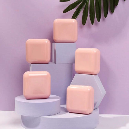 Geometric Photo Props Set in Various Sizes and Colors showing pastel pink polymer foam cubes on lavender geometric platforms for product photography
