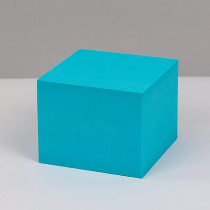 Geometric Photo Props Set in Various Sizes and Colors — single turquoise foam cube for product photography setups