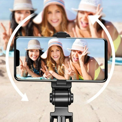Compact Selfie Stick for Daily Travel and Event Photos capturing three friends on beach group selfie with phone mounted on compact tripod
