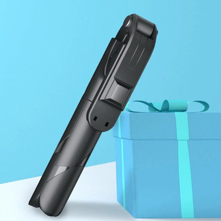 Compact Selfie Stick for Daily Travel and Event Photos folded black compact selfie stick next to gift box for travel and events