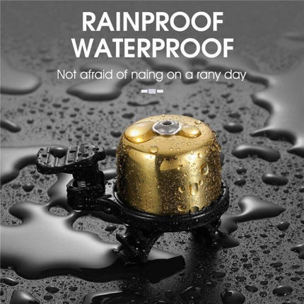 West Biking Copper Bicycle Bell Black For Everyday Riding - rainproof copper bell with matte black mount on wet surface