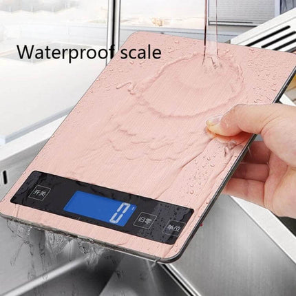 Portable USB Kitchen Scale For Precise Cooking And Baking showing rose gold waterproof stainless steel surface with LED display and hand rinsing