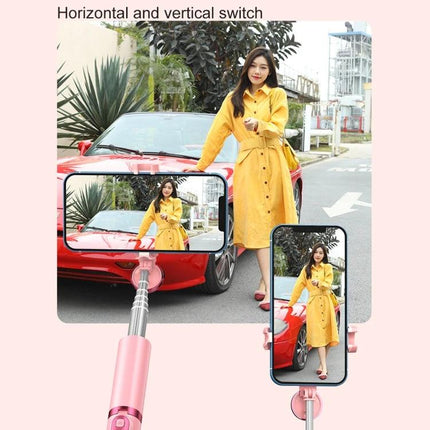 Compact Tripod for Everyday Selfies and Travel Moments — woman in yellow dress using pink compact tripod for steady selfie by red car