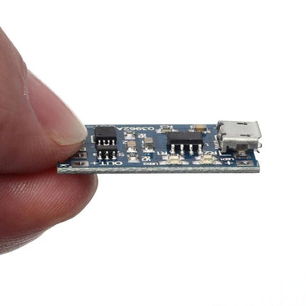 Set of 10 Micro USB Lithium Battery Charger Boards shown close-up held between fingers, micro USB input and components visible