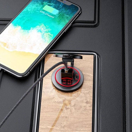 Waterproof USB Charger for Cars and Motorcycles With Fast Charge installed in vehicle cup holder charging smartphone via QC 3.0 cable