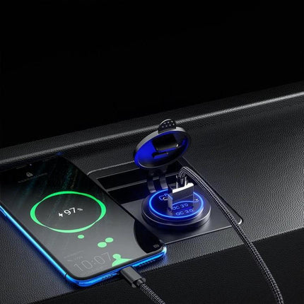 Waterproof USB Charger for Cars and Motorcycles With Fast Charge installed in car cup holder powering smartphone with blue LED and braided cable