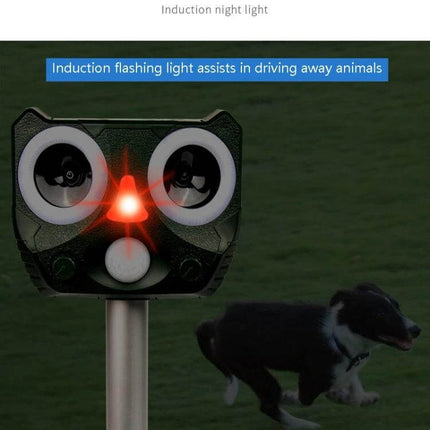Outdoor Solar Ultrasonic Insect Repellent For Gardens on stake showing induction flashing light and red LED to deter animals in yard