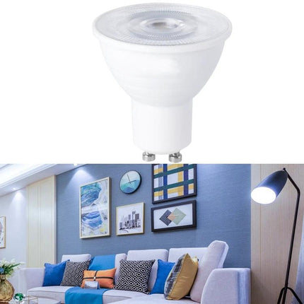 Energy-Saving LED Bulb for Everyday Household Lighting shown above a well-lit living room with warm and cool white lighting options