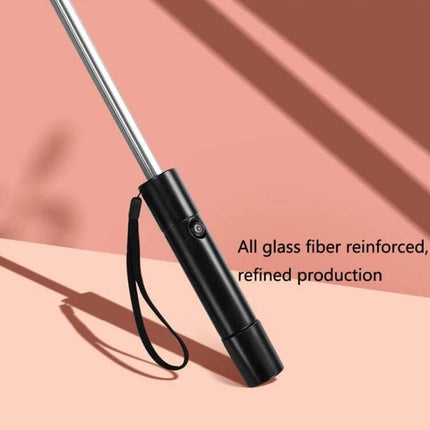 Stylish Long-Handle Umbrella with Built-in Fan for Sun and Rain Protection showing black handle and wrist strap on pink background