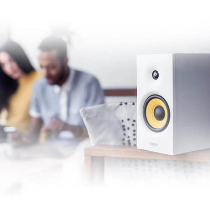Edifier Bluetooth Desktop Speakers For Home Office Casual Listening white bookshelf speaker with yellow cone on desk