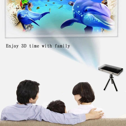 Portable Mini Projector for Home and Mobile Viewing showing family watching 3D movie projected onto wall with dolphin image