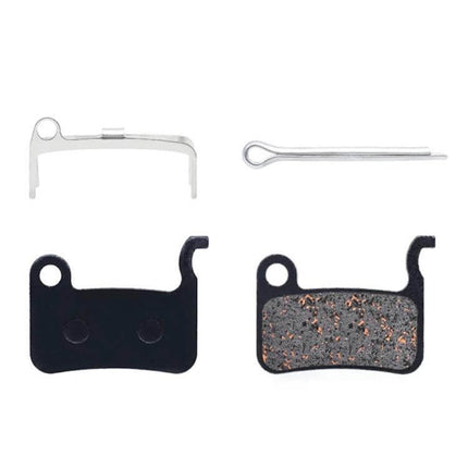 Mountain Bike Semi-Metallic Brake Pads for Disc Brakes showing copper-fiber pads with steel back plates and mounting springs
