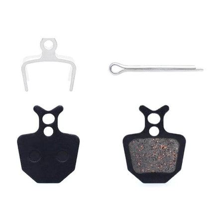 Mountain Bike Semi-Metallic Brake Pads for Disc Brakes - copper-fiber pads with steel back plate and mounting spring for bicycle disc calipers