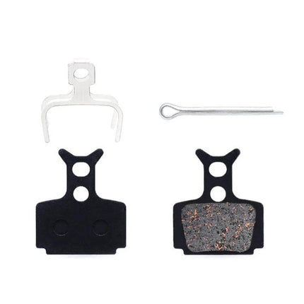 Mountain Bike Semi-Metallic Brake Pads for Disc Brakes showing pair of pads, copper-fiber compound and steel back plates with spring and pin