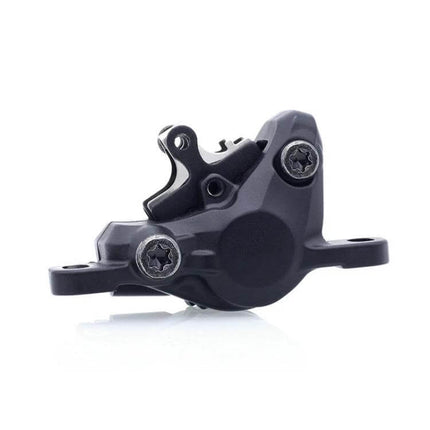 Mountain Bike Semi-Metallic Brake Pads for Disc Brakes - close-up of black disc brake caliper with copper-fiber pad and steel back plate, easy-fit design