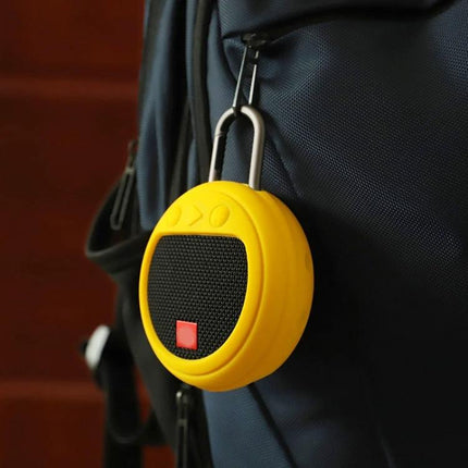 Silicone Cover Protects JBL Clip 3 for Daily Travel and Home Use — yellow silicone case on speaker clipped to backpack