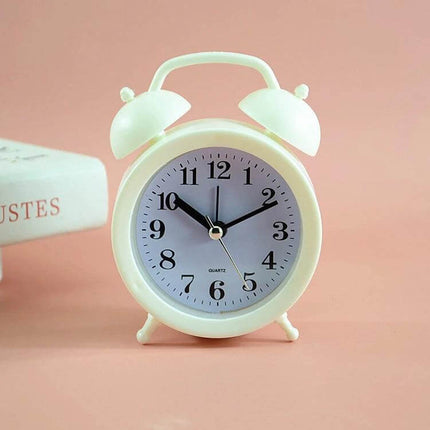 Student Desk Alarm Clock, Small, 2-Pack For Study Or Bedroom Use - compact white twin-bell alarm clock on pink desk, ideal for study or nightstand