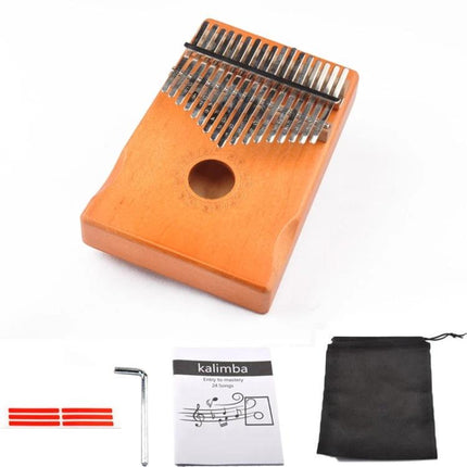 Compact Kalimba for Relaxing Home Music Moments - pine thumb piano with metal keys, tuning wrench, stickers, manual and pouch for travel and relaxation
