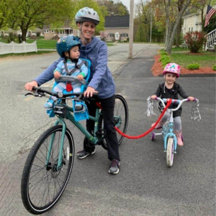 Bicycle Tow Rope 1.7m Stretch to 3m for Parent-Child Rides — parent towing child on bike with elastic nylon tow rope for calm teaching rides