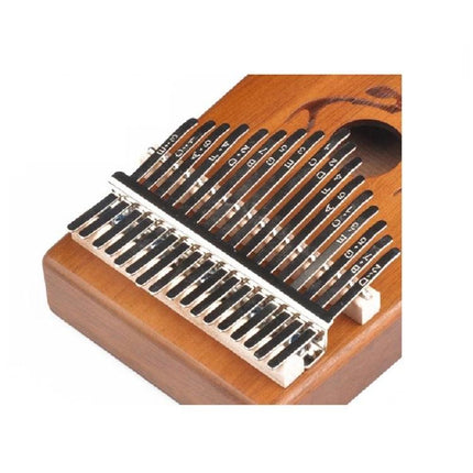 Beginner Kalimba Thumb Piano for Daily Music Relaxation and Learning, acacia wood body with metal keys close-up for practice and travel