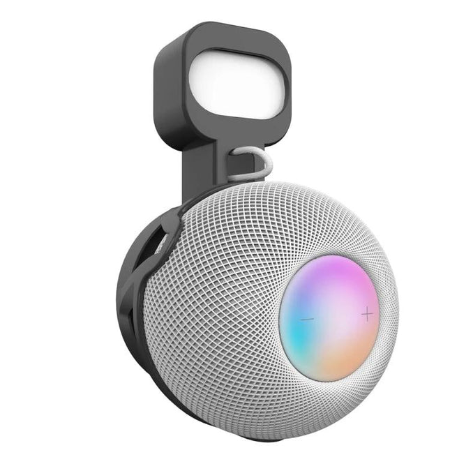 Wall Mount For HomePod Mini With Cable Management Stand mounted on wall holding HomePod Mini with hidden cord routing