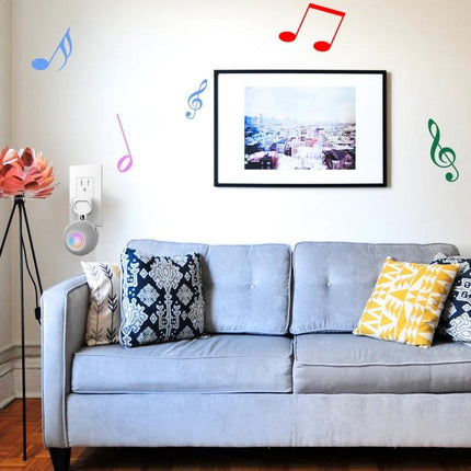 Wall Mount For HomePod Mini With Cable Management Stand installed beside couch, adhesive no-drill mount neatly routes cable and secures speaker
