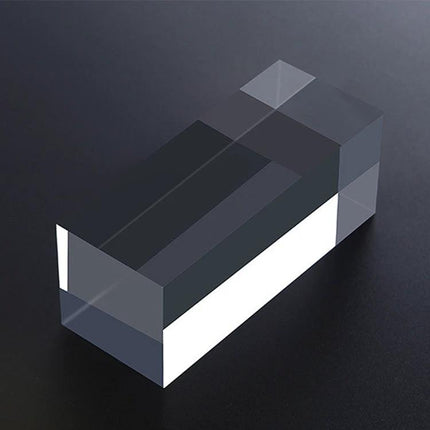 Acrylic Geometric Photo Props for Studio Backgrounds and Ornaments displayed as a clear rectangular prism prop on a dark studio surface