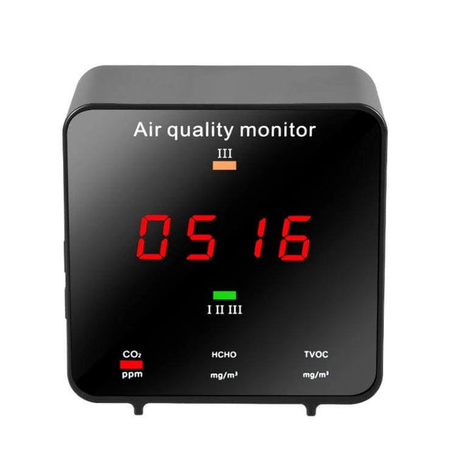 Portable Air Quality Detector for CO2 and Formaldehyde Monitoring compact black tabletop monitor showing CO2 ppm 0516 and HCHO indicator