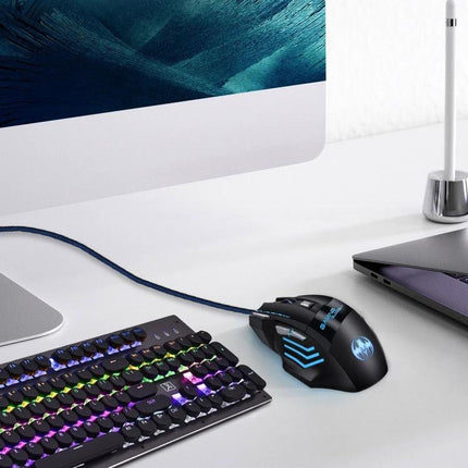 Bloodbat Wired Gaming Mouse with RGB Breathing Lights on desk next to RGB keyboard and monitor, wired USB gaming setup