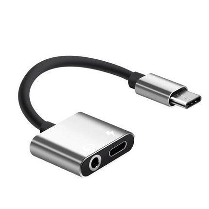 Adapter for Daily Headphone Use with USB-C Devices connecting wired 3.5mm headphones and charging port, compact silver USB-C audio and power adapter