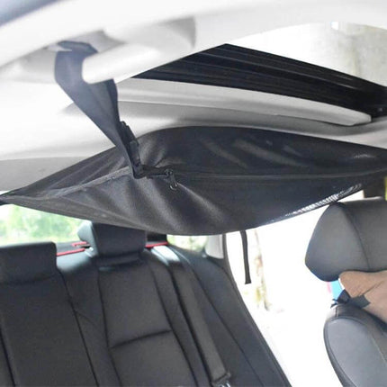 Car Storage Pocket With Breathable Mesh For Roof Or Seat installed overhead in car holding magazines and small items, breathable mesh and strap attachment