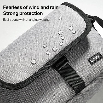 Baona Waterproof Camera Shoulder Bag for Everyday Use showing water droplets on grey Oxford cloth flap highlighting waterproof protection