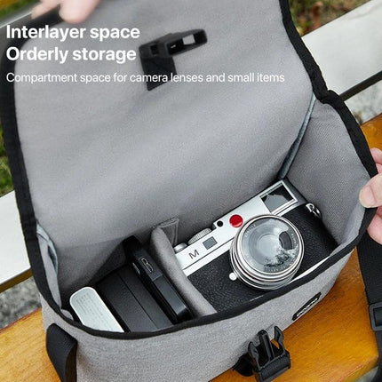 Baona Waterproof Camera Shoulder Bag for Everyday Use showing open bag with camera, lens compartments and phone for outdoor carry