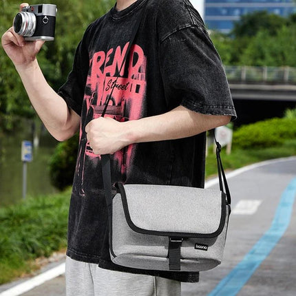 Baona Waterproof Camera Shoulder Bag for Everyday Use - gray Oxford cloth waterproof camera bag worn crossbody with film camera