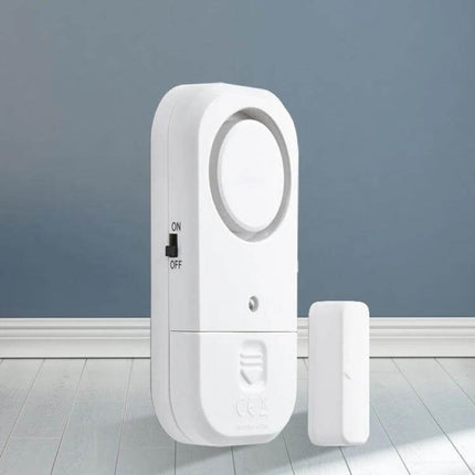 Wireless Magnetic Alarm for Home Door and Window Security - white wireless magnetic door and window sensor with on/off switch, compact home security alarm