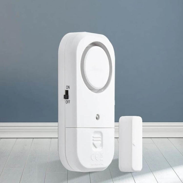 Wireless Magnetic Alarm for Home Door and Window Security - white wireless magnetic door and window sensor with on/off switch, compact home security alarm