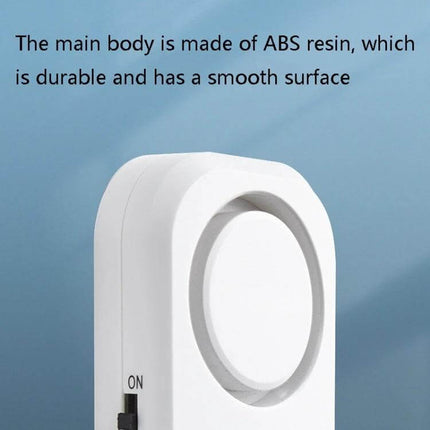 Wireless Magnetic Alarm for Home Door and Window Security - white ABS resin alarm unit with circular siren and ON switch, durable smooth surface