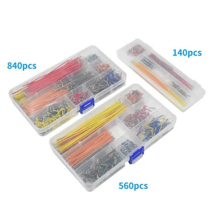 Breadboard Jumper Wire Kit with Assorted Lengths and Quantities showing organized plastic cases with 840pcs, 560pcs and 140pcs colored jumper wires