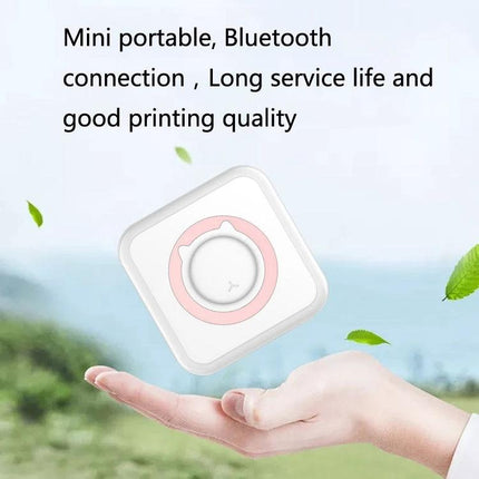 Versatile Portable Bluetooth Mini Printer for Notes and Photos shown handheld, compact white thermal printer with Bluetooth connectivity and pink accent